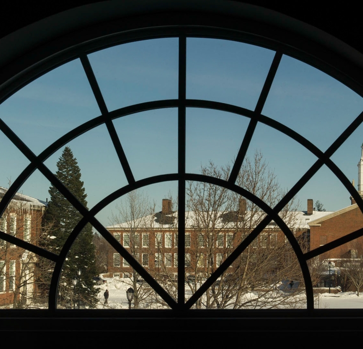 Winter campus scene through window at SUNY Buffalo State.